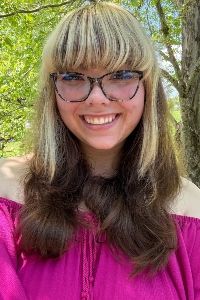 Headshot of Widener student Dallas Woodruff outside underneath a canopy of trees