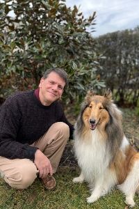 John DeSantis Headshot 300x200 Alumnus John DeSantis with his therapy dog, Ingrid, a collie